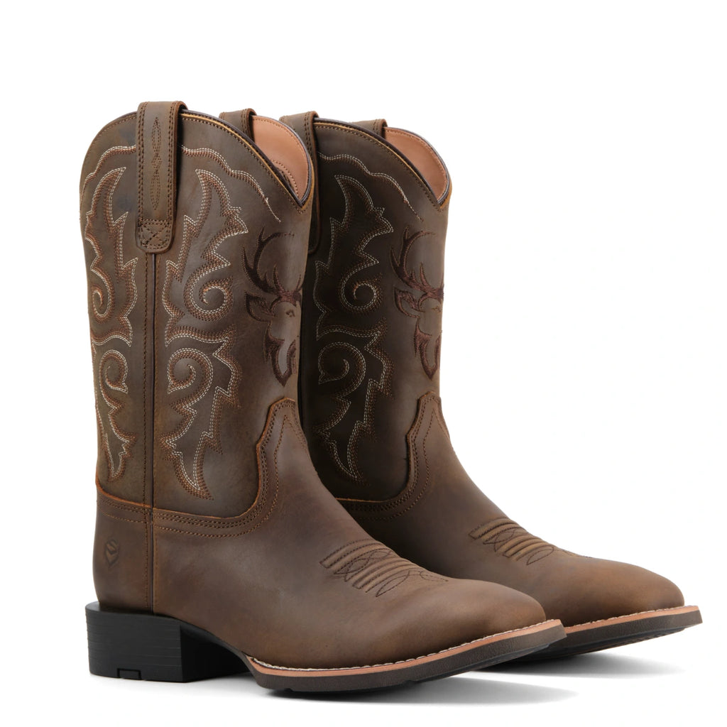 Pair of SUREWAY 1015 men's brown Western boots, three-quarter view showing decorative shaft stitching.