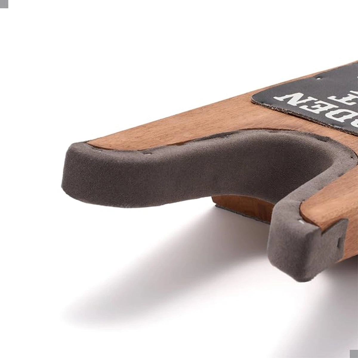 Close-up of the soft lining inside the SUREWAY wooden boot jack’s U-shaped heel opening.